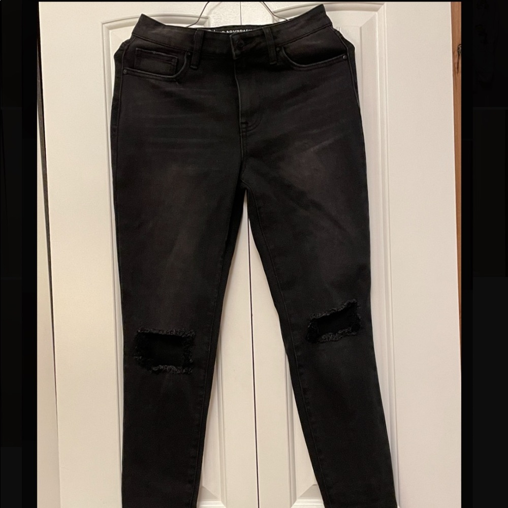 Black, open knee jeans.